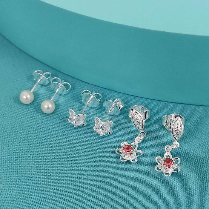 TRIO DE BRINCOS PÉROLA, FLOR COM ZIRCÔNIA E FOLHA PENDENTE FLOR STRASS ROSA